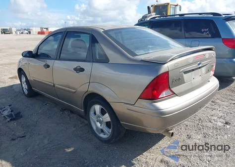 2004 Ford Focus Zts z USA, uszkodzony, nr VIN 1FAFP38Z84W183828